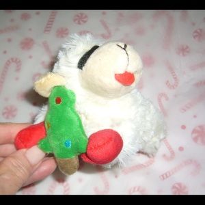 SOLD.      .      Lamb Chop with Christmas Tree Large Plush Dog Toy Med-